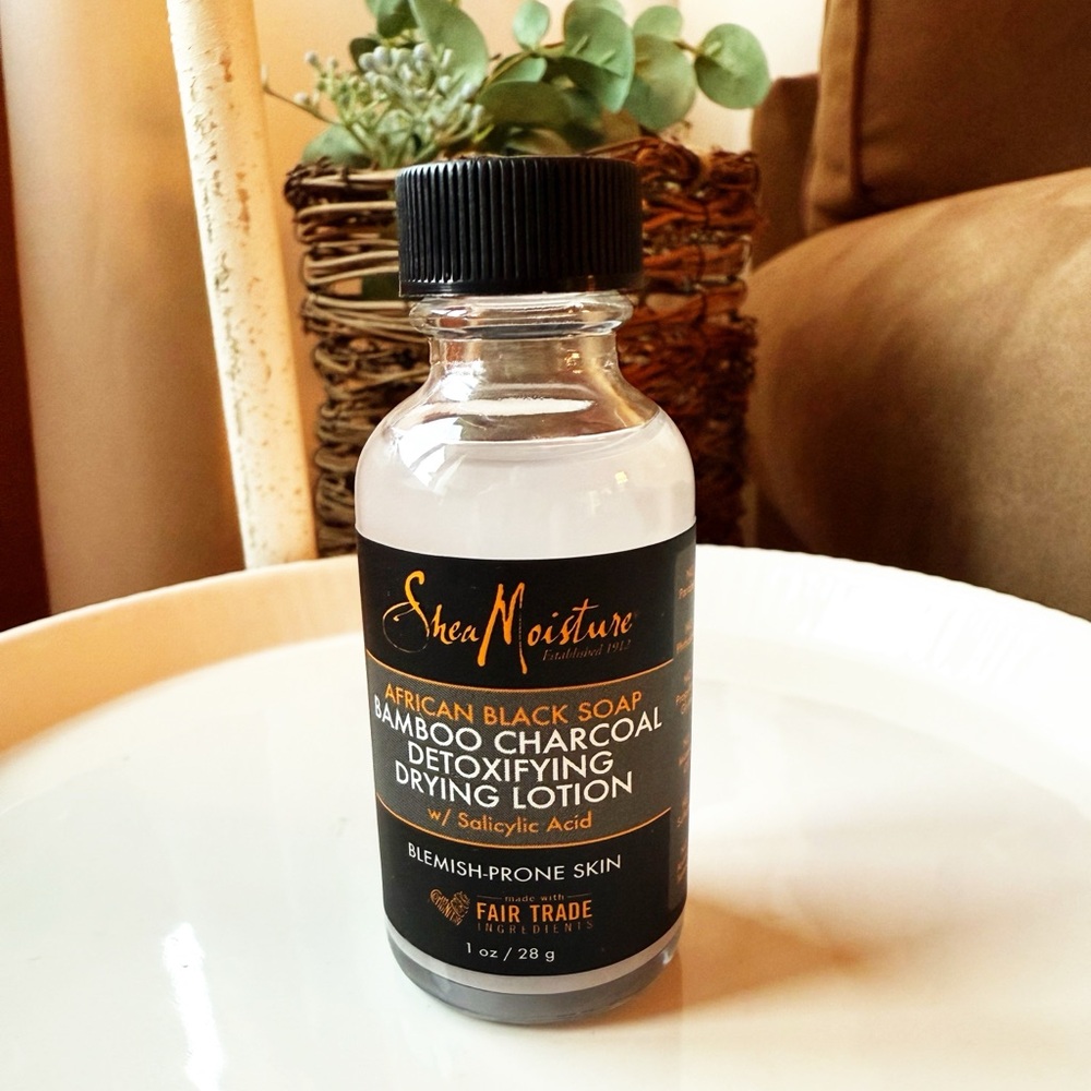Shea Moisture's African Black Soap and Bamboo Charcoal Drying Lotion  - NEW
